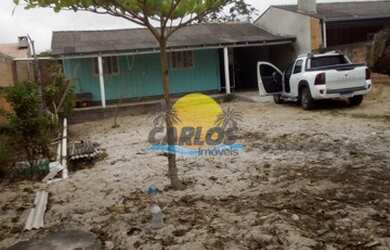 Imagem: A casa possui 2 Dormitórios, 1 Banheiro, 1 Vaga na garagem