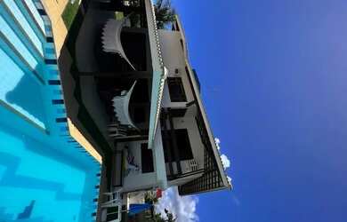 Imagem: A casa em condomínio possui 4 Dormitórios, 5 Banheiros, 5