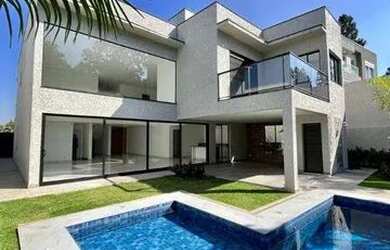 Imagem: A casa em condomínio possui 4 Dormitórios, 5 Banheiros, 5