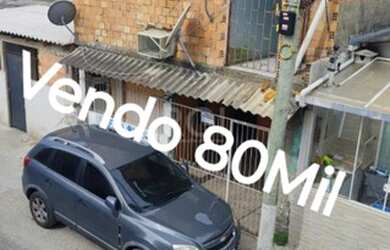 Imagem: A casa possui 3 Dormitórios, 2 Banheiros, 1 Vaga na garagem