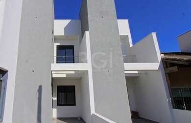 Imagem: A casa possui 2 Dormitórios, 2 Banheiros, 1 Vaga na garagem