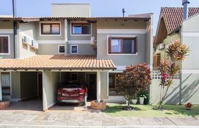 Imagem: A casa em condomínio possui 3 Dormitórios, 3 Banheiros, 2