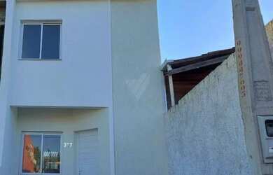 Imagem: A casa possui 2 Dormitórios, 2 Banheiros, 1 Vaga na garagem