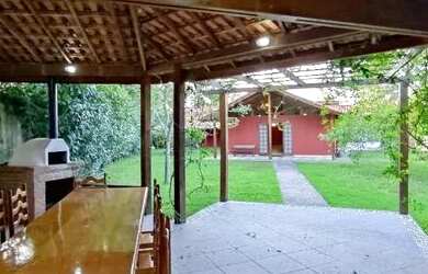 Imagem: A casa em condomínio possui 4 Dormitórios, 4 Banheiros, 4