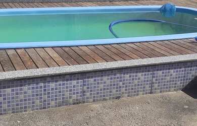 Imagem: A casa possui 3 Dormitórios, 3 Banheiros, 4 Vagas na garagem