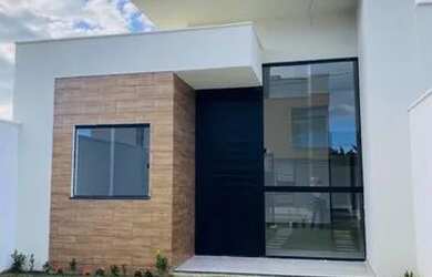 Imagem: A casa possui 3 Dormitórios, 3 Banheiros, 2 Vagas na garagem