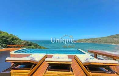 Imagem: A casa possui 5 Dormitórios, 5 Banheiros, 5 Vagas na garagem