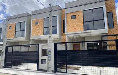 Imagem: A casa possui 3 Dormitórios, 3 Banheiros, 96m² de Área e