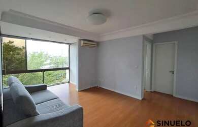 Imagem: O apartamento possui 2 Dormitórios, 1 Banheiro, 1 Vaga na garagem