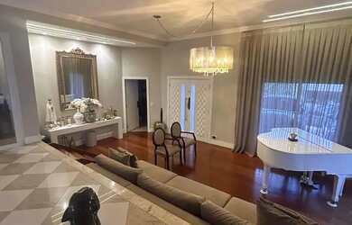 Imagem: A casa em condomínio possui 4 Dormitórios, 5 Banheiros, 4