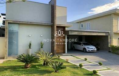 Imagem: A casa em condomínio possui 4 Dormitórios, 5 Banheiros, 4