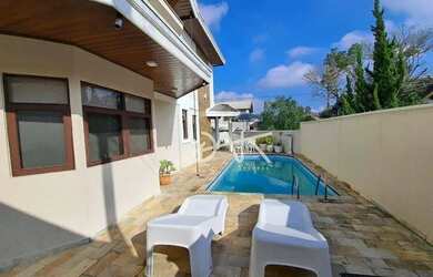 Imagem: A casa em condomínio possui 3 Dormitórios, 4 Banheiros, 2