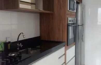 Imagem: O apartamento possui 2 Dormitórios, 1 Banheiro, 1 Vaga na garagem