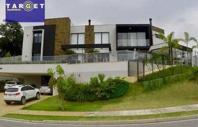 Imagem: A casa em condomínio possui 5 Dormitórios, 5 Banheiros, 5