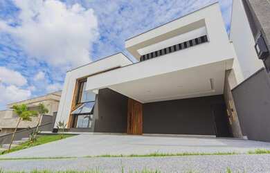 Imagem: A casa em condomínio possui 4 Dormitórios, 5 Banheiros, 5