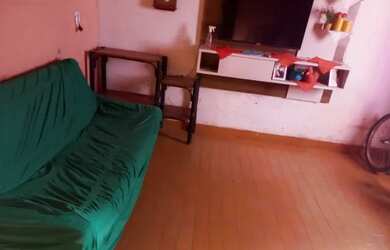 Imagem: A casa possui 3 Dormitórios, 2 Banheiros, 3 Vagas na garagem