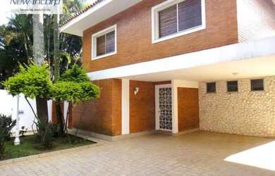 Imagem: A casa possui 5 Dormitórios, 4 Banheiros, 2 Vagas na garagem