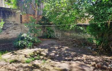 Imagem: A casa possui 3 Dormitórios, 1 Banheiro, 1 Vaga na garagem