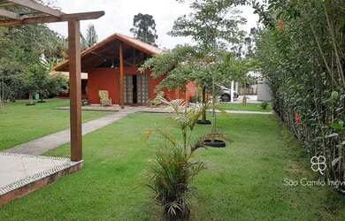 Imagem: A casa em condomínio possui 4 Dormitórios, 5 Banheiros, 2