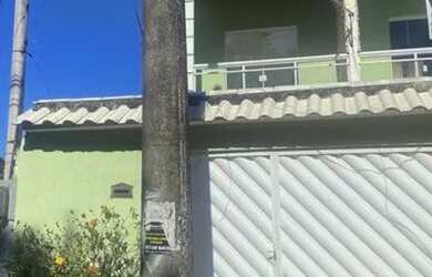 Imagem: A casa possui 2 Dormitórios, 2 Banheiros e 1 Vaga na garagem