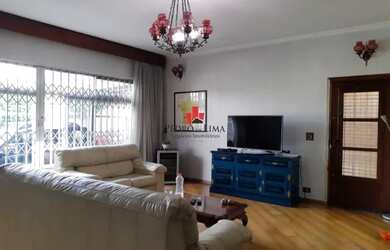 Imagem: A casa possui 3 Dormitórios, 2 Banheiros, 3 Vagas na garagem