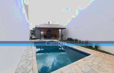 Imagem: A casa possui 3 Dormitórios, 3 Banheiros, 4 Vagas na garagem