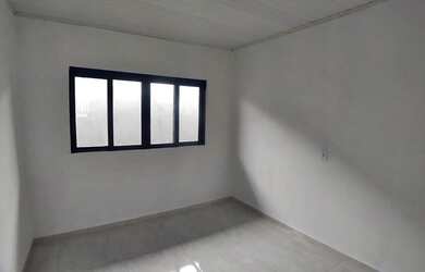 Imagem: A casa possui 3 Dormitórios, 2 Banheiros, 1 Vaga na garagem