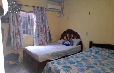 Imagem: A casa possui 3 Dormitórios, 3 Banheiros, 2 Vagas na garagem