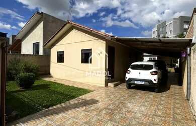 Imagem: A casa possui 5 Dormitórios, 2 Banheiros, 4 Vagas na garagem