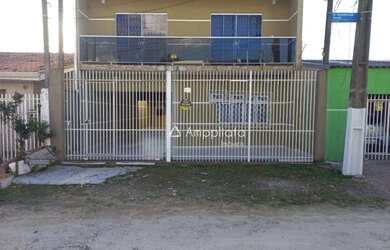 Imagem: A casa possui 5 Dormitórios, 2 Banheiros, 3 Vagas na garagem