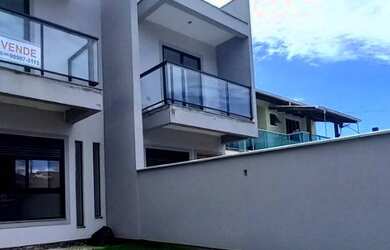 Imagem: A casa possui 2 Dormitórios, 1 Banheiro, 2 Vagas na garagem