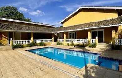 Imagem: A casa em condomínio possui 4 Dormitórios, 5 Banheiros, 5