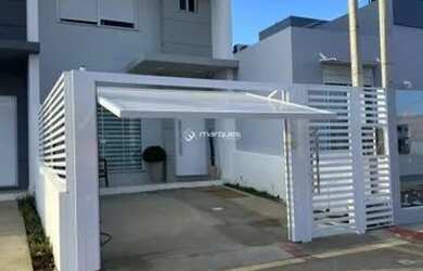 Imagem: A casa possui 3 Dormitórios, 2 Banheiros, 1 Vaga na garagem