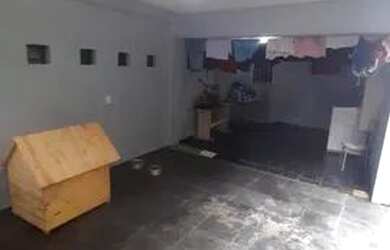 Imagem: A casa possui 5 Dormitórios, 4 Banheiros, 2 Vagas na garagem