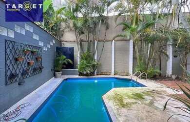 Imagem: A casa possui 3 Dormitórios, 3 Banheiros, 3 Vagas na garagem