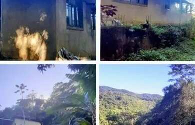 Imagem: A casa possui 3 Dormitórios, 2 Banheiros, 4 Vagas na garagem