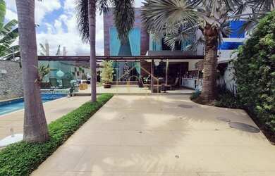 Imagem: A casa em condomínio à venda possui 4 Dormitórios, 5 Banheiros