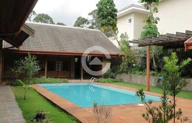 Imagem: A casa em condomínio possui 5 Dormitórios, 5 Banheiros, 3