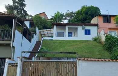 Imagem: A casa possui 2 Dormitórios, 1 Banheiro, 1 Vaga na garagem