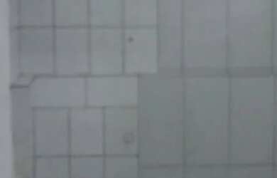 Imagem: A casa possui 3 Dormitórios e 1 Banheiro e está localizado