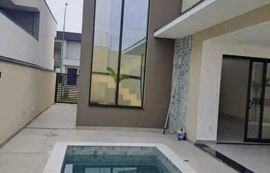 Imagem: A casa possui 3 Dormitórios, 4 Banheiros, 4 Vagas na garagem