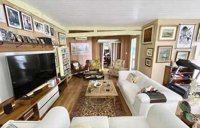 Imagem 7: Charmosa casa assinada por Zanina Caldas com encantadora vista panorâmica!