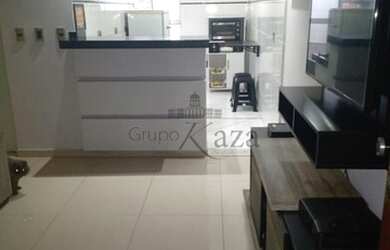 Imagem: O apartamento possui 2 Dormitórios, 1 Banheiro, 1 Vaga na garagem