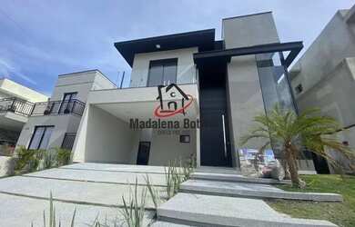 Imagem: A casa em condomínio possui 4 Dormitórios, 5 Banheiros, 4