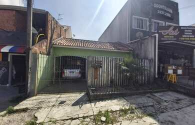 Imagem: A casa possui 3 Dormitórios, 1 Banheiro, 1 Vaga na garagem