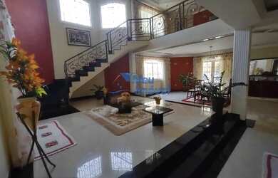 Imagem: A casa em condomínio possui 5 Dormitórios, 4 Banheiros, 3