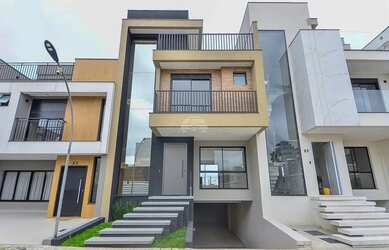 Imagem: A casa possui 3 Dormitórios, 5 Banheiros, 5 Vagas na garagem