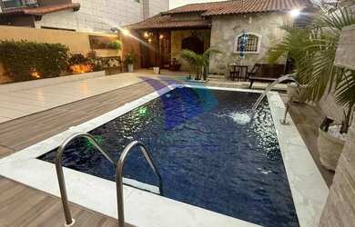 Imagem: A casa possui 3 Dormitórios, 3 Banheiros, 3 Vagas na garagem