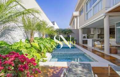 Imagem: A casa em condomínio possui 4 Dormitórios, 4 Banheiros, 3