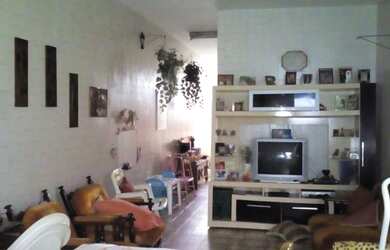 Imagem: A casa possui 5 Dormitórios, 3 Banheiros, 148m² de Área e